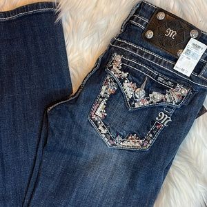 Miss Me Jeans from Cavender’s, signature boot cut style with jewels on pockets.